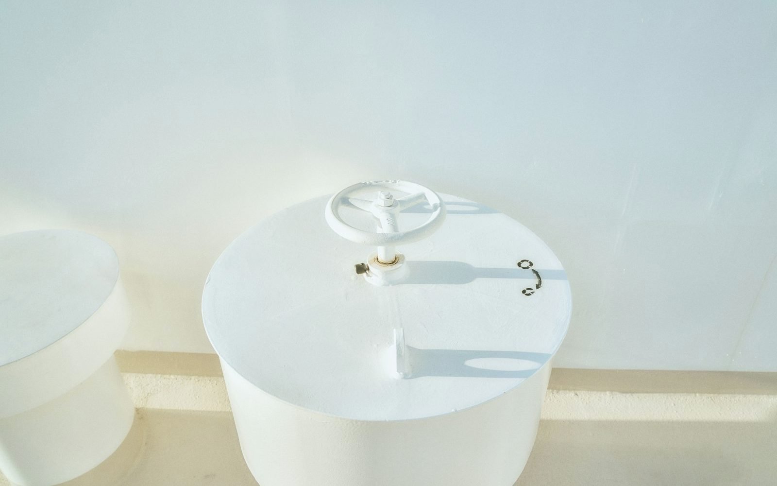 A clean hotel bathroom sink in morning light